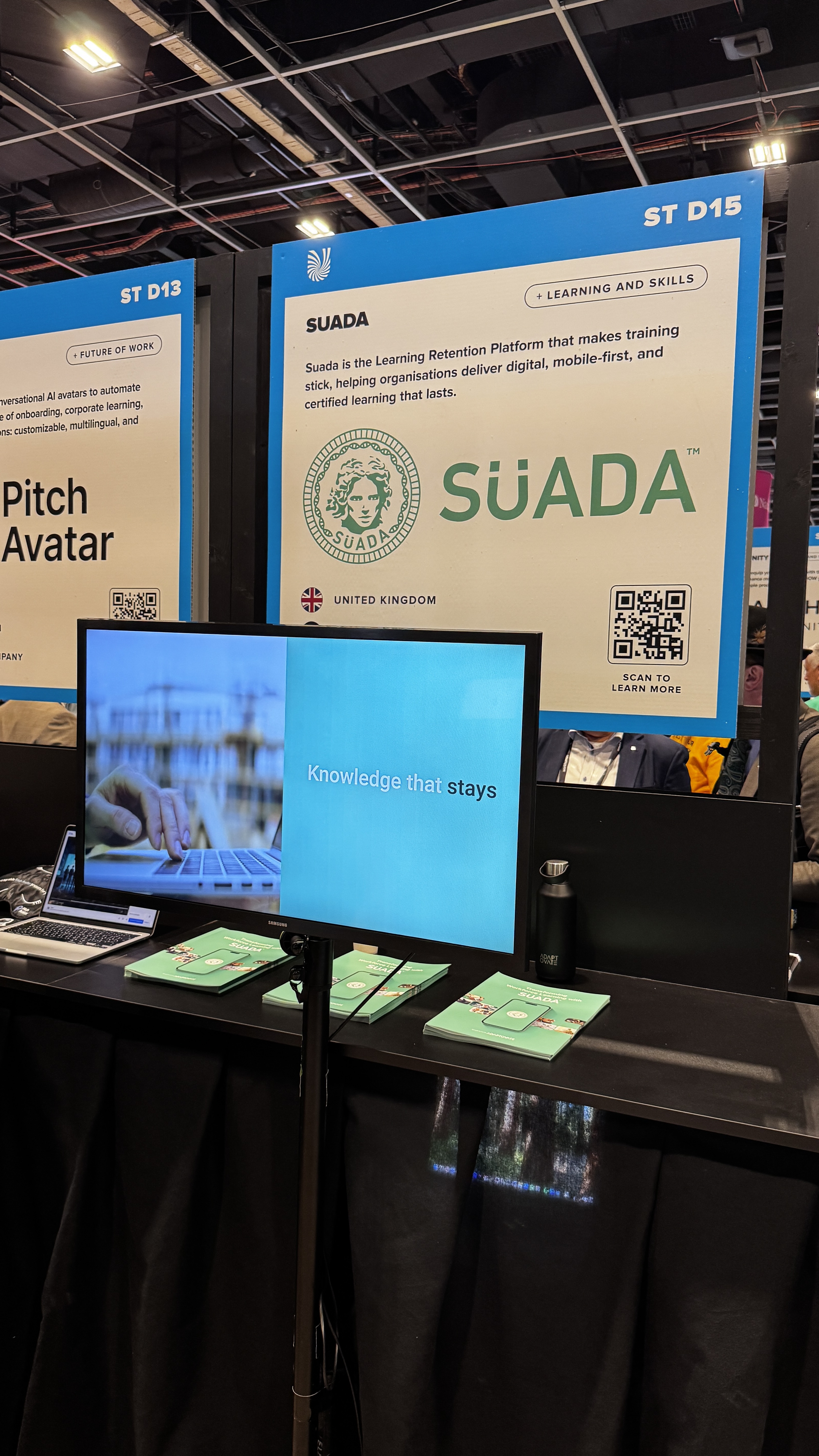 Suada booth at Unleash HR Conference in Paris, showing the company branding and Knowledge that stays tagline